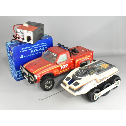 A Radio Controlled Toyota Pickup Truck with Acoms Four Channel Controller and Big Track Programmable Vehicle, All Untested