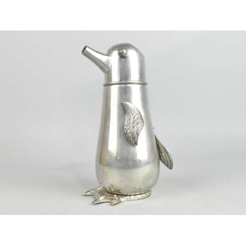 48 - A Novelty Pewter Cocktail Shaker in the Form of a Penguin, Dent to Head, 22cms High