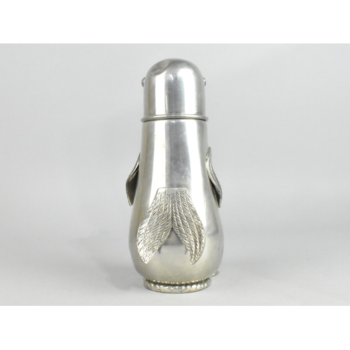 48 - A Novelty Pewter Cocktail Shaker in the Form of a Penguin, Dent to Head, 22cms High