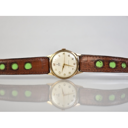 A Tudor Royal 9ct Gold Cased Gents Wristwatch, Face with Gilt Arabic Numerals and Lance Hands, Inscribed Tudor Royal, Shock Resisting, Swiss, Polished Case Measuring 32mm Diameter and Inscribed Verso 'Royal Doulton Long Service', to the Interior Hallmarked for Edinburgh 1956 and Numbered 24558 and Inscribed Rolex, Currently Ticking