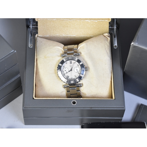 A Collection of Three Stainless Steel Wristwatches to include Two ...