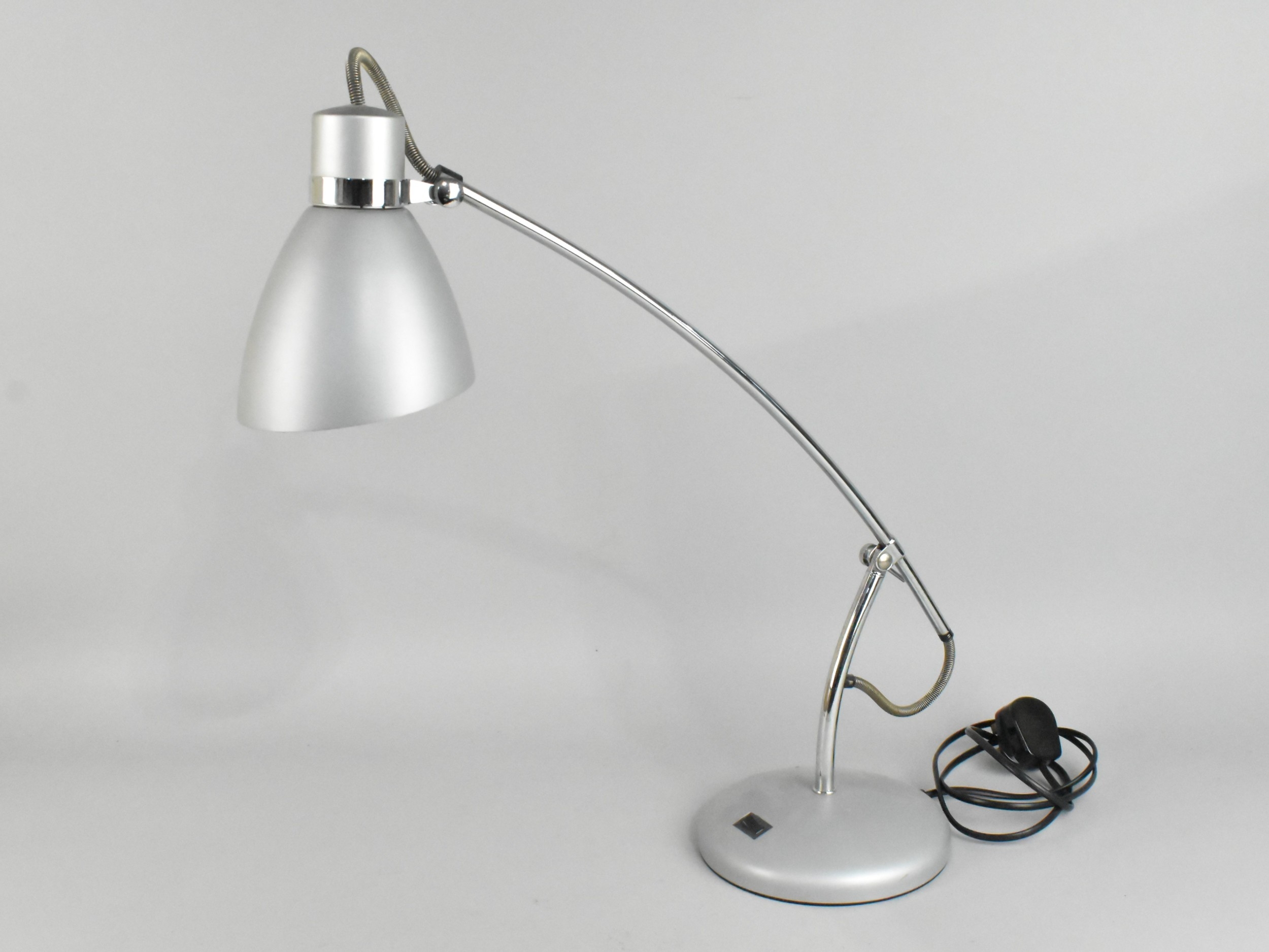 A Modern Vintage Style Desktop Reading Lamp with chromed support