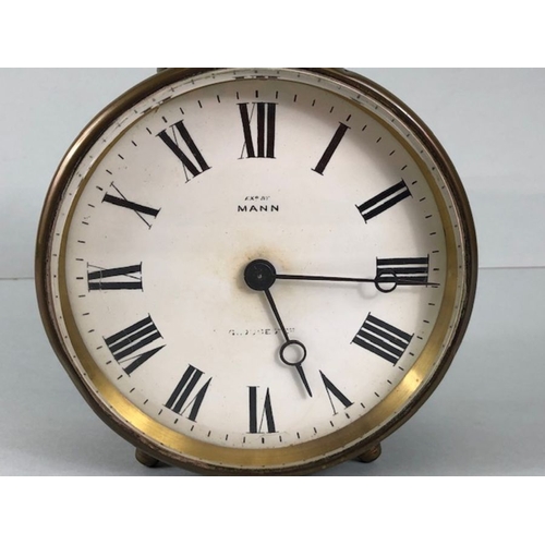 105 - Antique clock, Brass cased drum mantel clock printed dial with Roman numerals marked EXD By MANN Bev... 