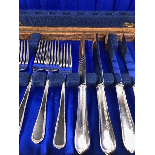 107 - Silver Cutlery, boxed set of dinner knives and forks from the American international company all mar... 