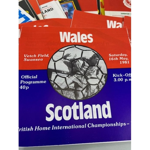 112 - Football interest, collection of Wales international football programs from the 70s 80s to include  ... 