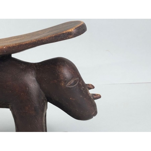 118 - African Tribal neck rest, carved wooden neck rest in the shape of 2 Rhino end to end approximately 3... 