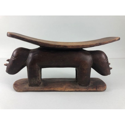 118 - African Tribal neck rest, carved wooden neck rest in the shape of 2 Rhino end to end approximately 3... 