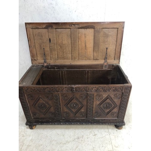 120 - Antique oak chest, Ornately carved European oak chest, 4 panel top with reeded decoration the sides ... 