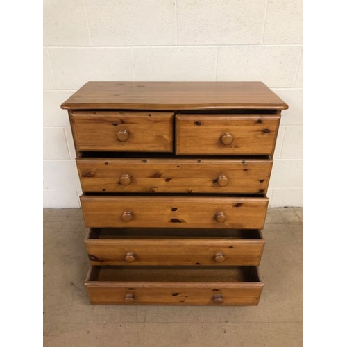 125 - Pine chest of drawers, modern pine with run of 4 drawers and 2 above on bun feet  approximately 85 x... 