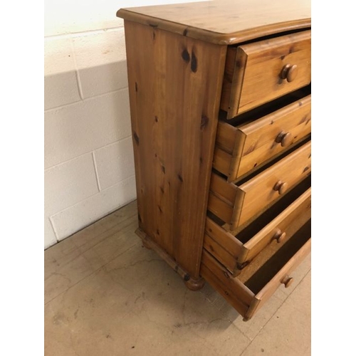 125 - Pine chest of drawers, modern pine with run of 4 drawers and 2 above on bun feet  approximately 85 x... 