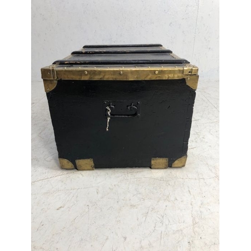 126 - Antique Furniture, Traveling trunk with black painted finish and polished brass banding , drop handl... 