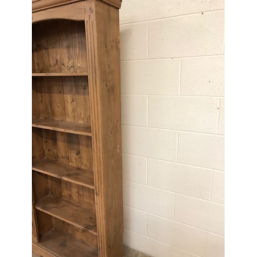 127 - Pine furniture , Tall Narrow pine bookcase with reeded decoration to front approximately 76 x 21 x 8... 