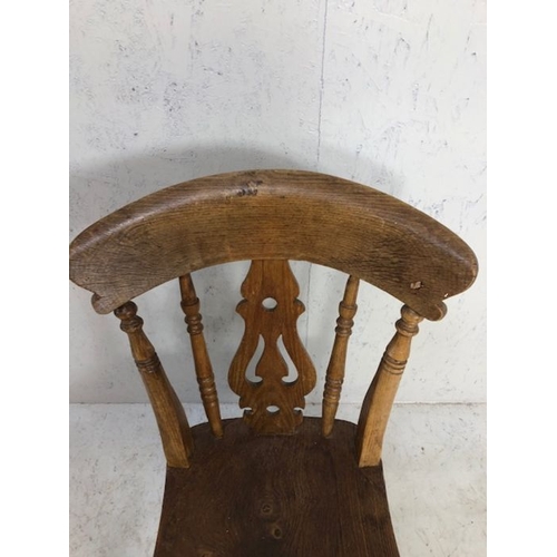 130 - Antique chair, a single Elm farmhouse lyre back kitchen chair on spinal legs