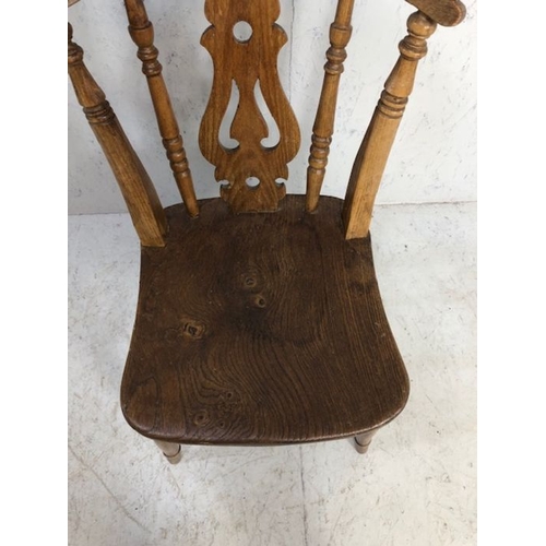 130 - Antique chair, a single Elm farmhouse lyre back kitchen chair on spinal legs