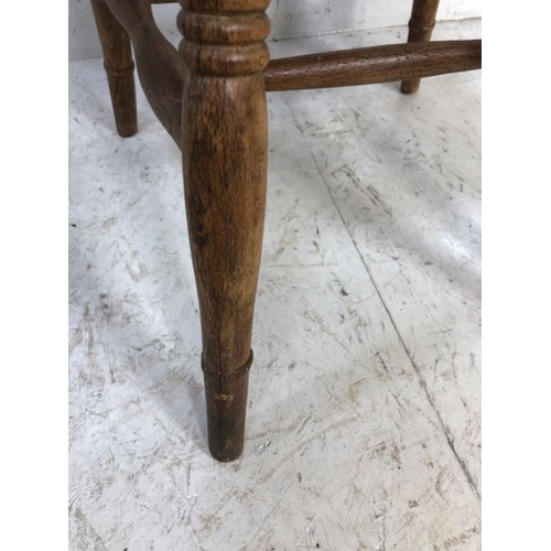 130 - Antique chair, a single Elm farmhouse lyre back kitchen chair on spinal legs