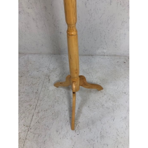 131 - Coat stand, modern light wood coat and hat stand on tripod base approximately 79 cm high