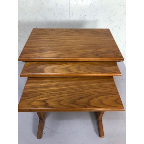 151 - Mid century furniture, a set of three nesting side tables in the Danish style the larger approximate... 