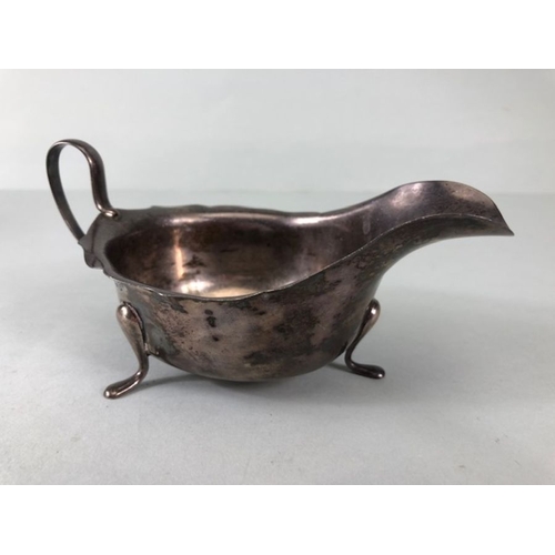 16 - silver, English silver hallmarked sauce boat on 3 legs  Sheffield 1881 approximately 97.3g