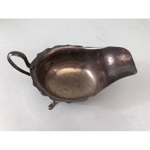 16 - silver, English silver hallmarked sauce boat on 3 legs  Sheffield 1881 approximately 97.3g