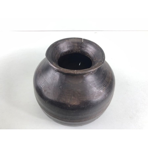 161 - Tribal interest, two Asia turned wooden Ghee pots of classic form the larger approximately 26cm high