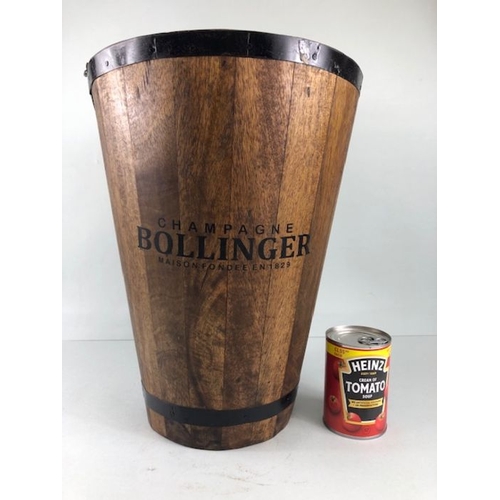 196 - Wooden champagne cooler, with metal banding, Bollinger printed on front approximately 31 x 40cm