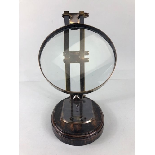 197 - Scientific style magnifying glass  on adjustable metal stand with wooden base approximately 28ch hig... 