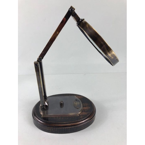 197 - Scientific style magnifying glass  on adjustable metal stand with wooden base approximately 28ch hig... 