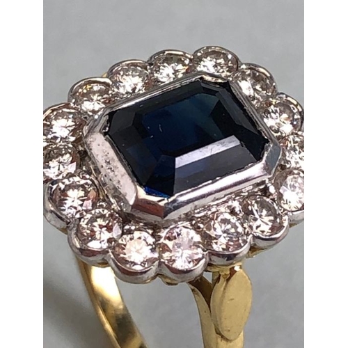 20 - 18ct yellow gold cluster ring ,cushion cut sapphire surrounded by diamonds mounted on a 18ct yellow ... 