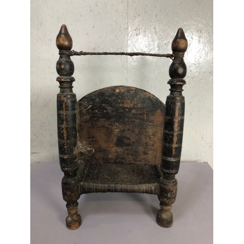 217 - Antique furniture, Indian Punjabi style chair of traditional design with carved back panel and turne... 