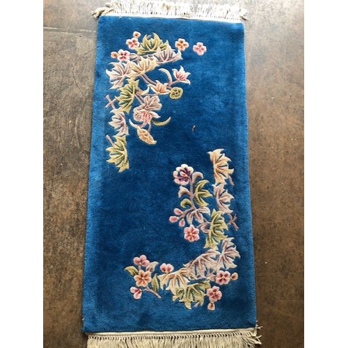 235 - Oriental rug, Chinese wool Rug with pattern of sculpted flowers on a blue background approximately 1... 