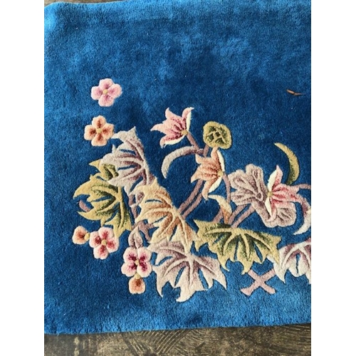 235 - Oriental rug, Chinese wool Rug with pattern of sculpted flowers on a blue background approximately 1... 