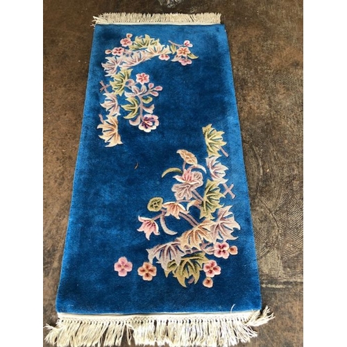 235 - Oriental rug, Chinese wool Rug with pattern of sculpted flowers on a blue background approximately 1... 