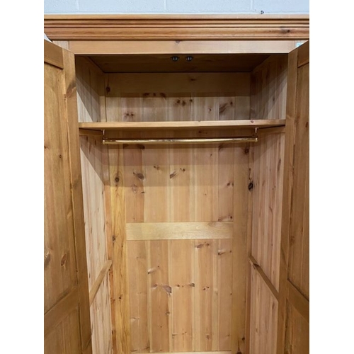 245 - Small pine two door wardrobe with shelf and hanging rail, approx 95cm x 60cm x 190cm