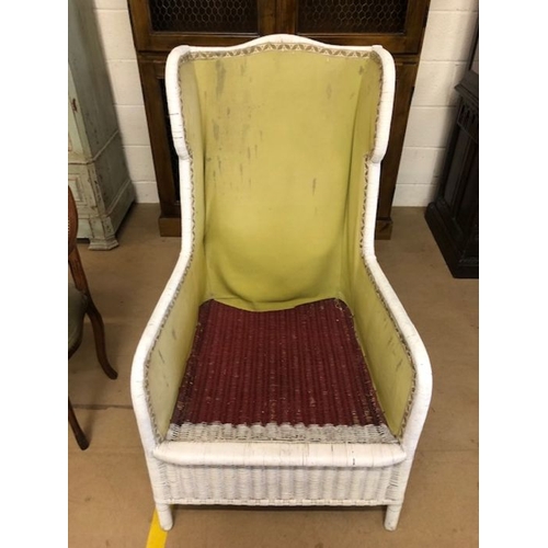 248 - White cane wingback armchair with upholstered lining (no cushions), approx 114cm in height (at back)