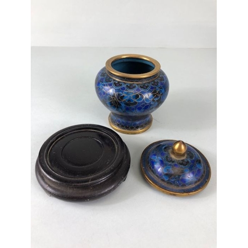 252 - Chinese cloisonne, a pair of  cloisonne cobalt blue urn vases with lids on wooden stands approximate... 