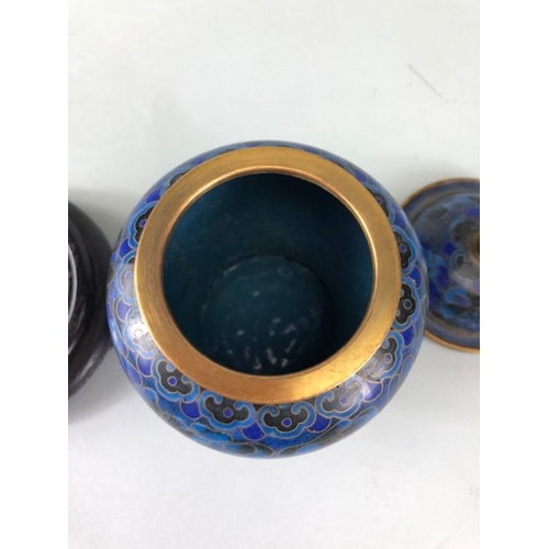 252 - Chinese cloisonne, a pair of  cloisonne cobalt blue urn vases with lids on wooden stands approximate... 