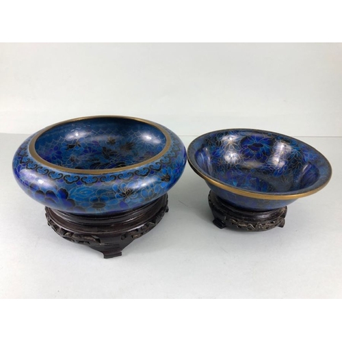 255 - Chinese Cloisonne, 2 Cobalt blue Cloisonne Enamel bowls on wooden stands, the larger approximately 2... 