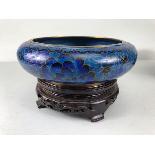 255 - Chinese Cloisonne, 2 Cobalt blue Cloisonne Enamel bowls on wooden stands, the larger approximately 2... 