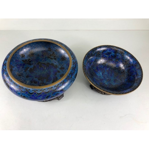 255 - Chinese Cloisonne, 2 Cobalt blue Cloisonne Enamel bowls on wooden stands, the larger approximately 2... 