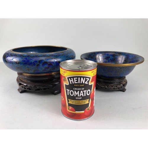 255 - Chinese Cloisonne, 2 Cobalt blue Cloisonne Enamel bowls on wooden stands, the larger approximately 2... 