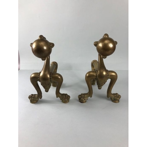 257 - Brass fire dogs, a pair of Ball and Claw fire dogs on 3 claw and ball feet approximately 27cm high