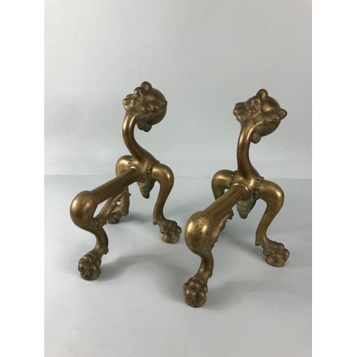 257 - Brass fire dogs, a pair of Ball and Claw fire dogs on 3 claw and ball feet approximately 27cm high