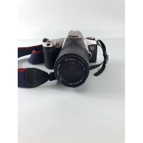 263 - Photographic interest, Canon EOS 500  automatic 35mm camera with 100-300 mm  zoom lens