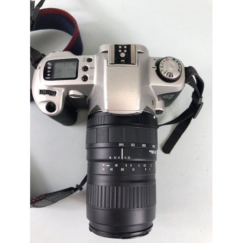 263 - Photographic interest, Canon EOS 500  automatic 35mm camera with 100-300 mm  zoom lens