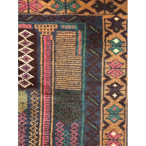 273 - Oriental Rug, Hand Knotted Wool  Old Baluchi Rug with geometric design approximately 136 x 79cm.