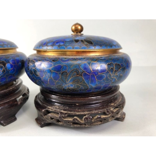 274 - Chinese Cloisonne, a pair of Chinese Cobalt Blue Cloisonne covered dishes on wooden stands approxima... 