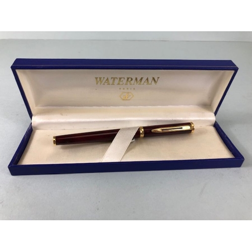 276 - Fountain pens, two Waterman fountain pens  one red lacquered with 18ct nib in box, the other brush f... 