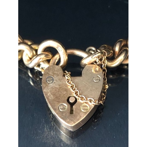 31 - 9ct Gold curb link bracelet with 9ct Gold heart shaped clasp and safety chain approx 16cm in length ... 