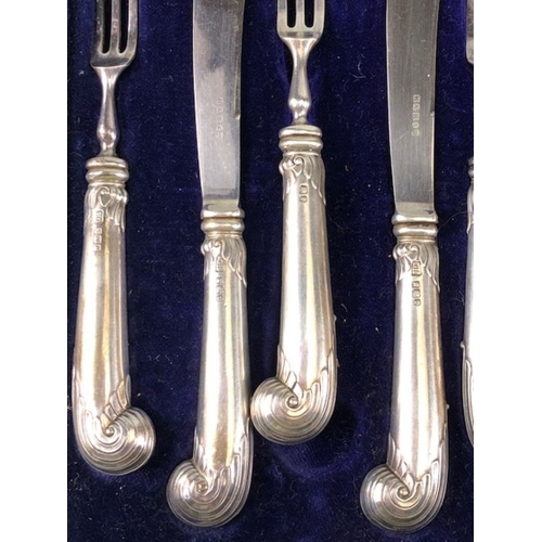 32 - Fully hallmarked twelve piece Silver handled (EPNS blades) fruit knife and forks by makers Harrison ... 