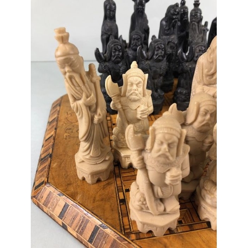 323 - Chess set, antique wooden marquetery chess board  and a chess set of Chinese immortals made from com... 